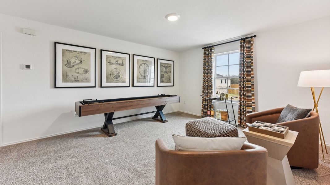 Furnished interior in a model home at Palomino in Manor (Image 37).