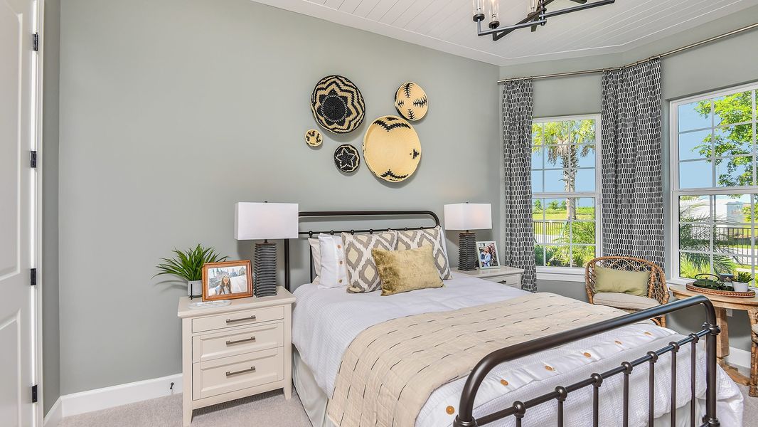 Furnished interior in a model home at Esplanade by the Islands in Naples (Image 39).