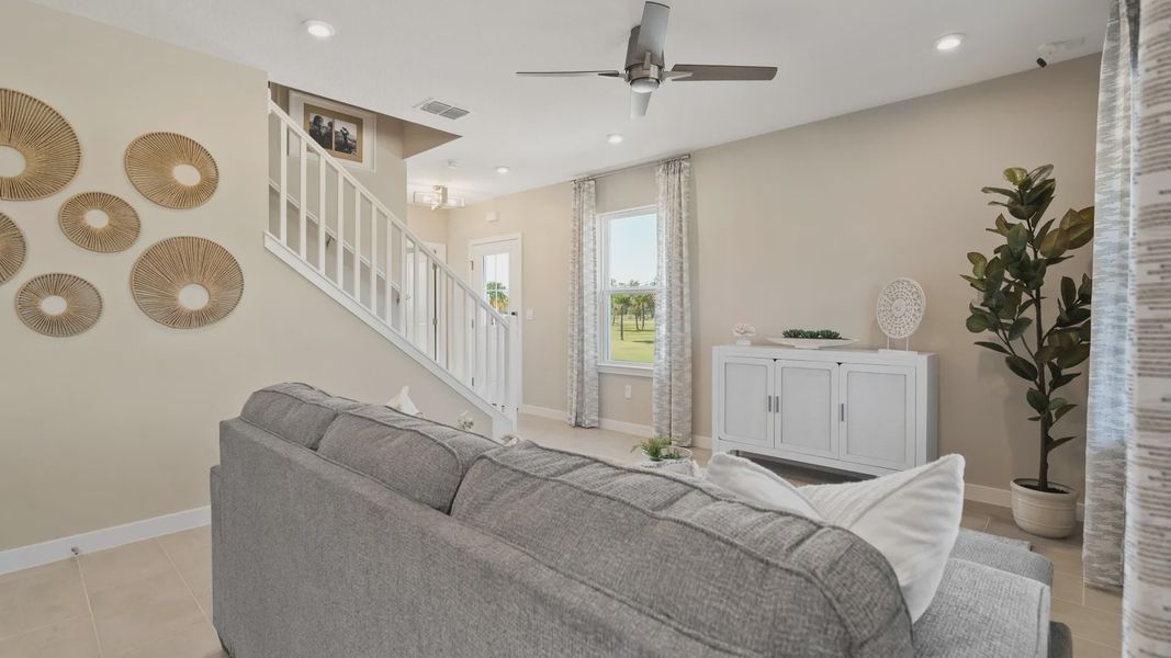 Cyrene at Harmony by DRB Homes offers an open living room with abundant natural light—bright, airy, and perfect for relaxing. Cyrene at Harmony by DRB Homes offers an open living room with abundant natural light—bright, airy, and perfect for relaxing.