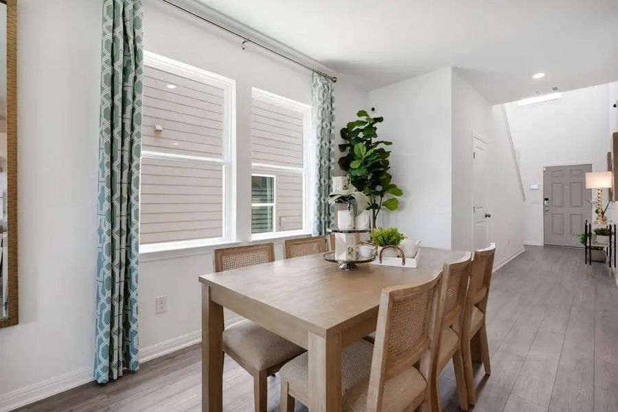 Furnished interior in a model home at Village Grove in Dripping Springs (Image 20).