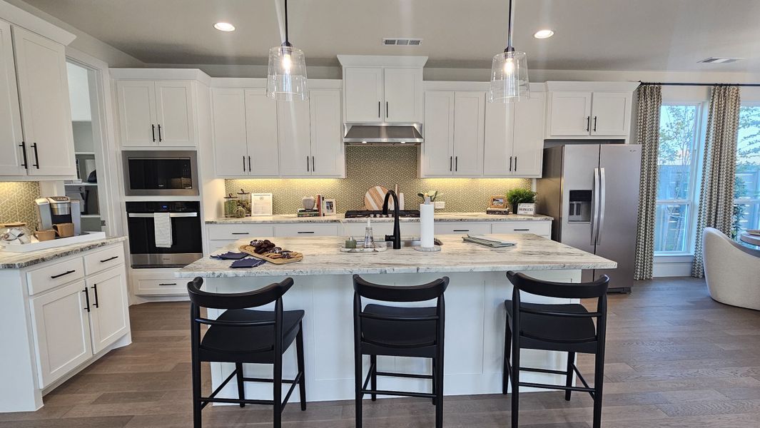 Furnished interior in a model home at Ramble 40s in Celina (Image 4).