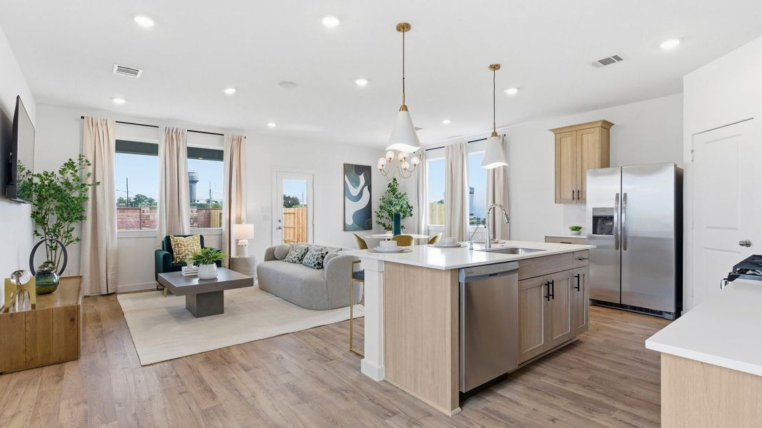 Furnished interior in a model home at Murphy Village in Missouri City (Image 3).