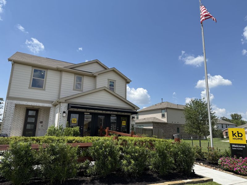 A charming home with landscaped greenery in Glendale Lakes North by KB Home (Arcola, TX).
