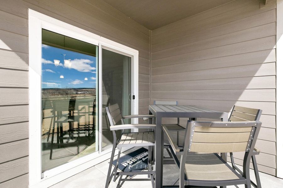 Furnished interior in a model home at Willow Springs Ranch in Monument (Image 24).
