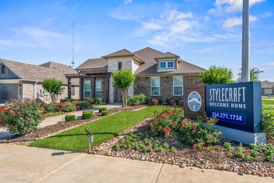 Entrance to the The Ridge at Belle Meadows community in Belton, TX, featuring signage and landscaping (Image 1). Entrance to the The Ridge at Belle Meadows community in Belton, TX, featuring signage and landscaping (Image 1).