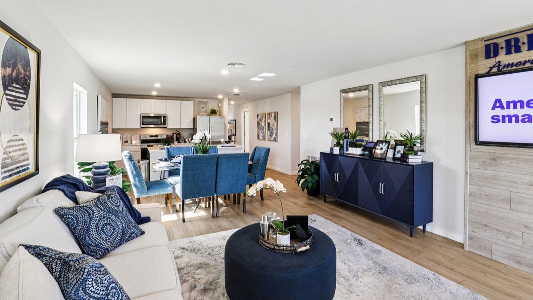 Furnished interior in a model home at Asher Park in Lehigh Acres (Image 16).