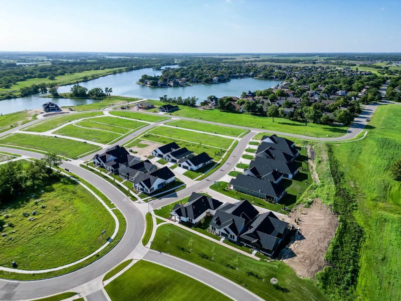 Aerial view of the The Courtyards at The Moorings community in Wichita, KS, showing layout and nearby surroundings (Image 5).