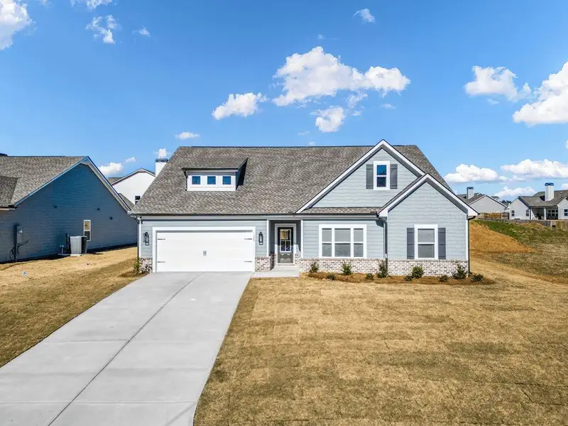 Front exterior of a home in the Harmony Farms community, located in Eatonton, GA (Image 2).