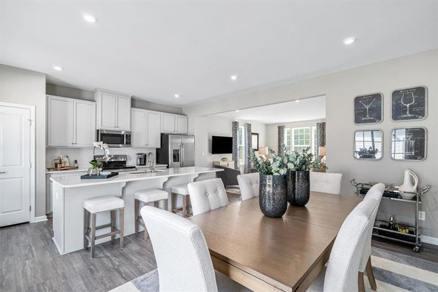 Furnished interior in a model home at The Mills at Rocky River Townhomes in Concord (Image 8).