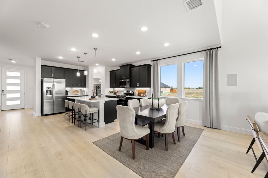 Furnished interior in a model home at South Meadow in Melissa (Image 15).