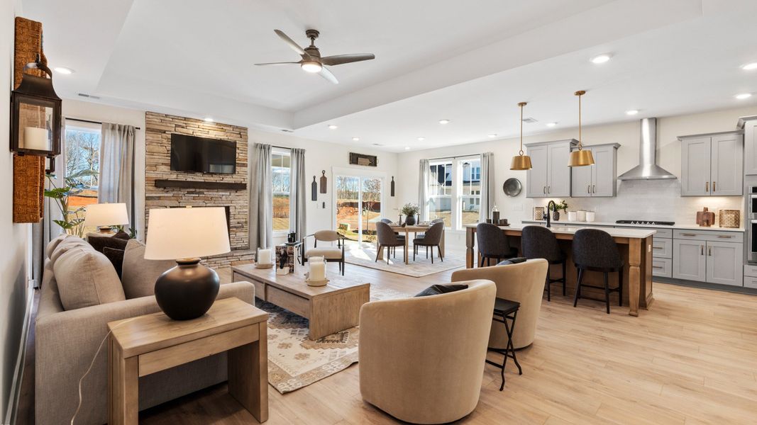 Superior design shines in this open-concept family room with timeless finishes and a modern edge at Robert's Farm