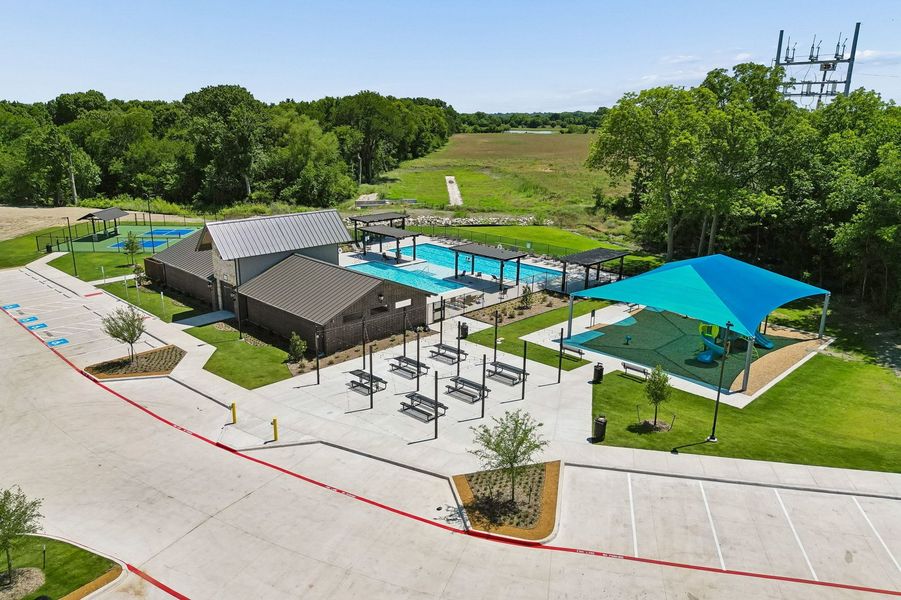 Front exterior of a home in the Creekside Ranch community, located in Blue Ridge, TX (Image 39).