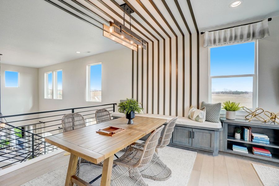 Furnished interior in a model home at Kitchel Lake at Serratoga Falls in Timnath (Image 33).