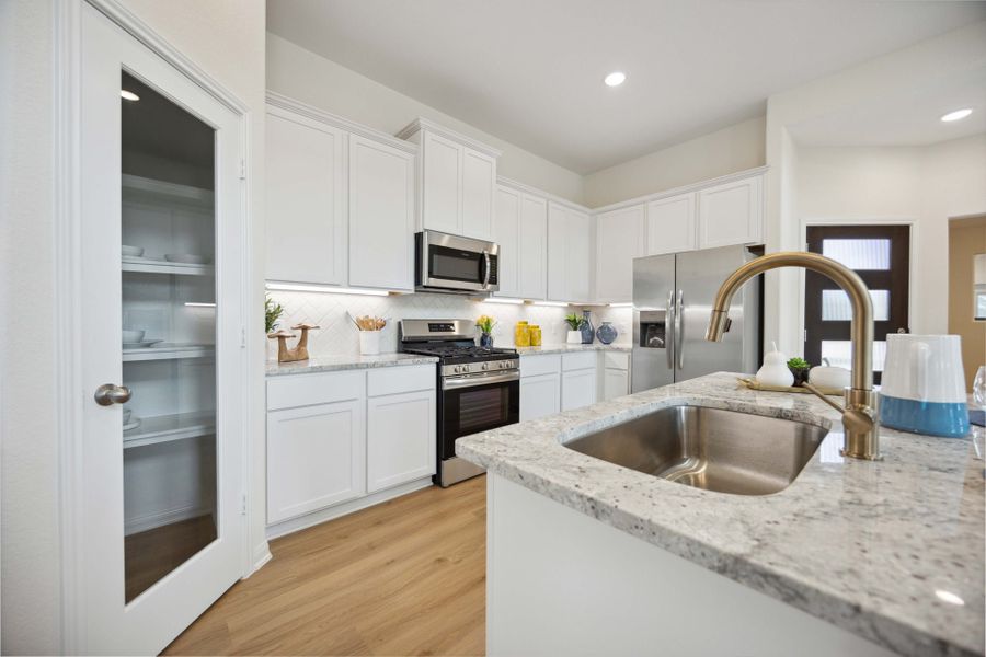 Furnished interior in a model home at Roman Forest in New Caney (Image 4).