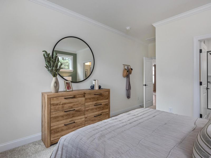 Furnished interior in a model home at Addison West in Holly Springs (Image 28).