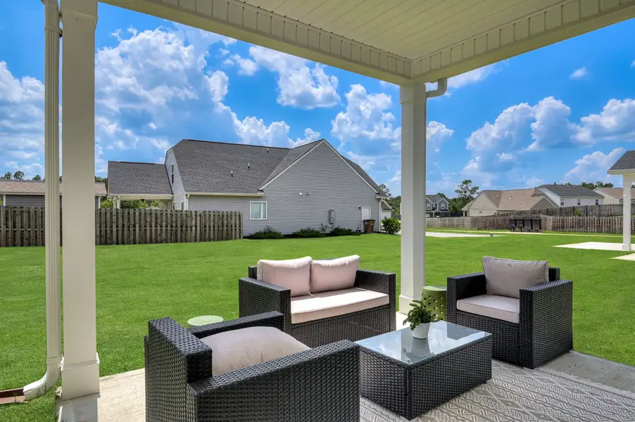 Outdoor living space offers a perfect spot for fresh air, morning coffee, or dining alfresco Outdoor living space offers a perfect spot for fresh air, morning coffee, or dining alfresco