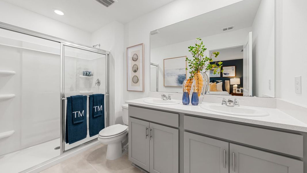 Furnished interior in a model home at The Towns at Tiburon in Nokomis (Image 38).