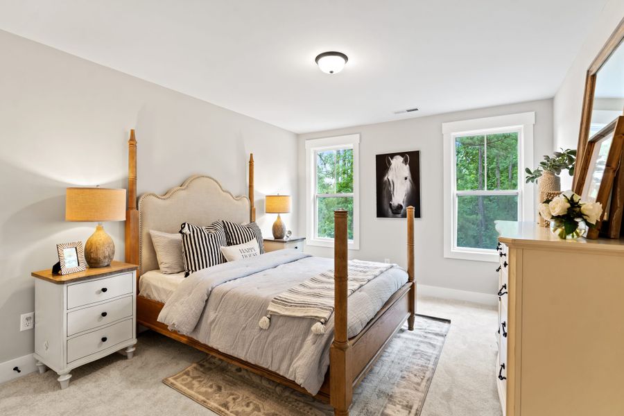 Furnished interior in a model home at River Tide Farms in Bolivia (Image 5).