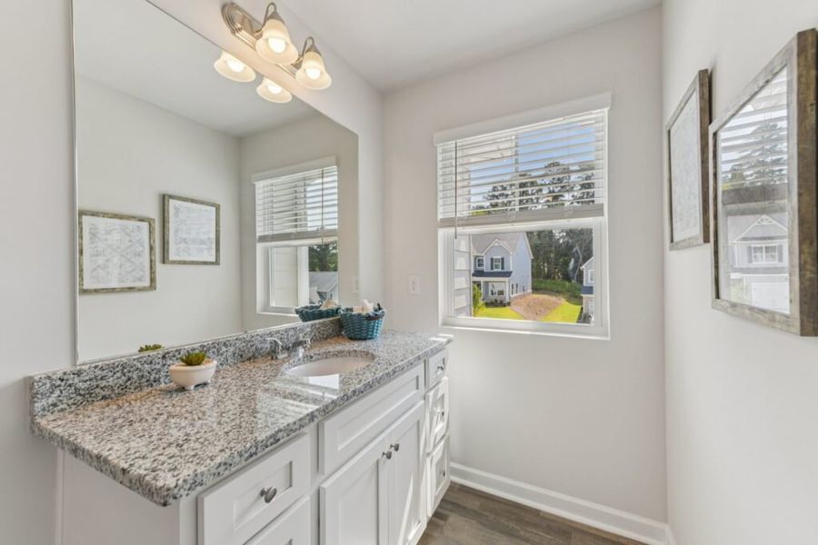 Furnished interior in a model home at The Hills at Cedar Creek in Winder (Image 69).