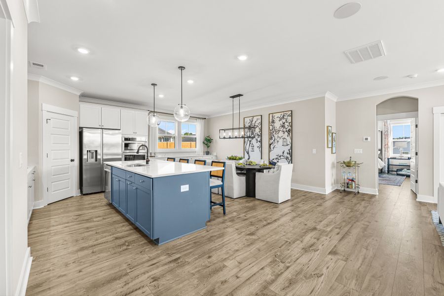 Furnished interior in a model home at Eagle Creek in Central (Image 3).
