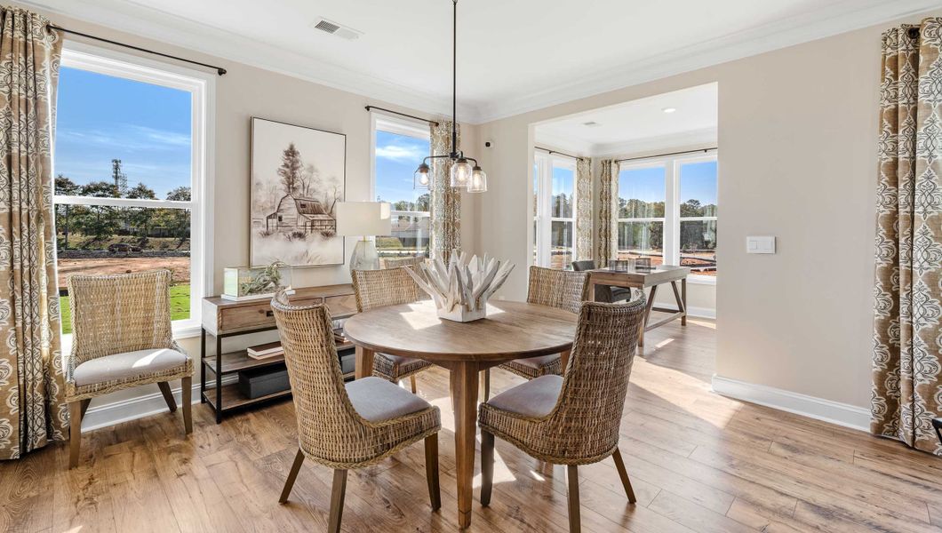Furnished interior in a model home at Adams Glen in Greenville (Image 13).
