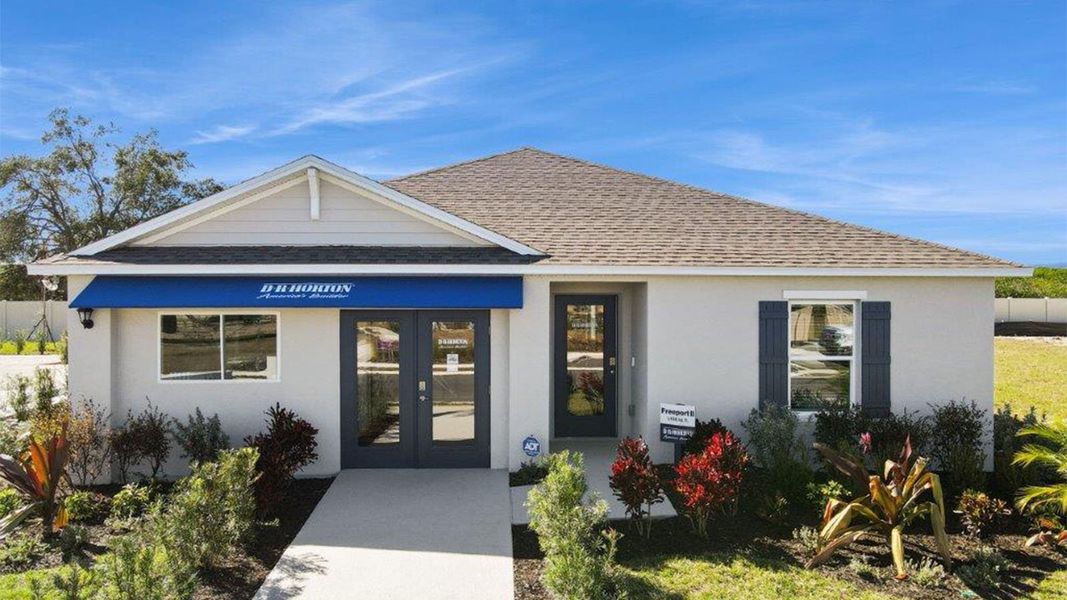 Front exterior of a home in the Willowbrook South community, located in Winter Haven, FL (Image 2).