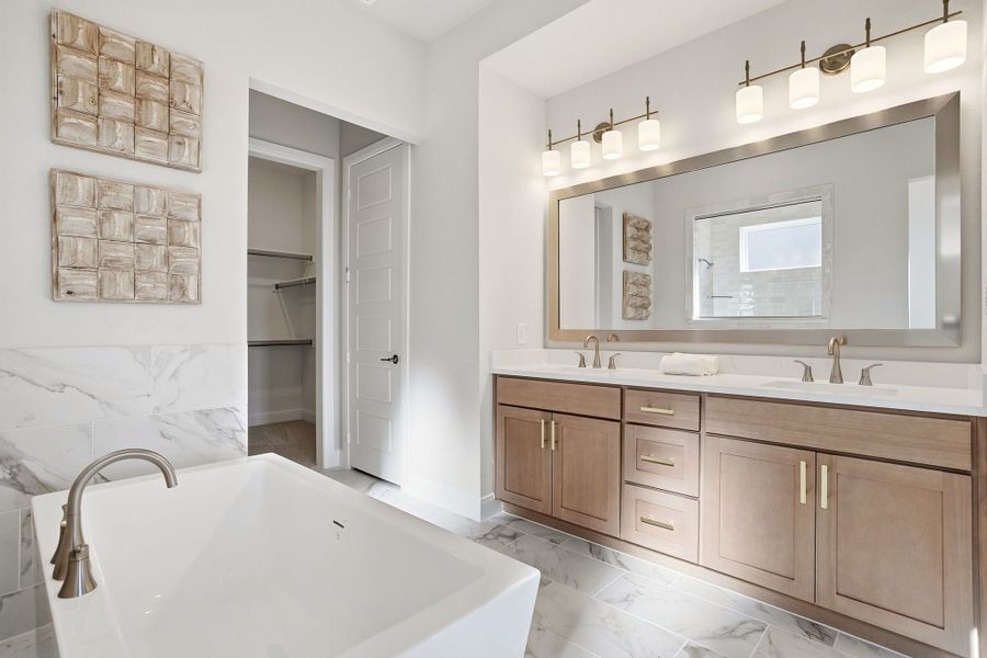 Furnished interior in a model home at Lily Creek at Sutton Fields in Aubrey (Image 58).