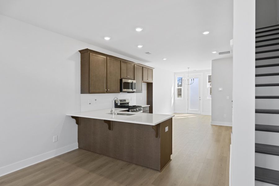 Furnished interior in a model home at Renaissance Place in Greenville (Image 12).