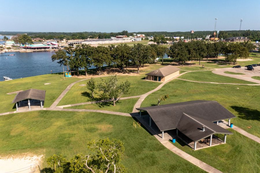 Aerial view of the The Pines at Seven Coves community in Willis, TX, showing layout and nearby surroundings (Image 11).