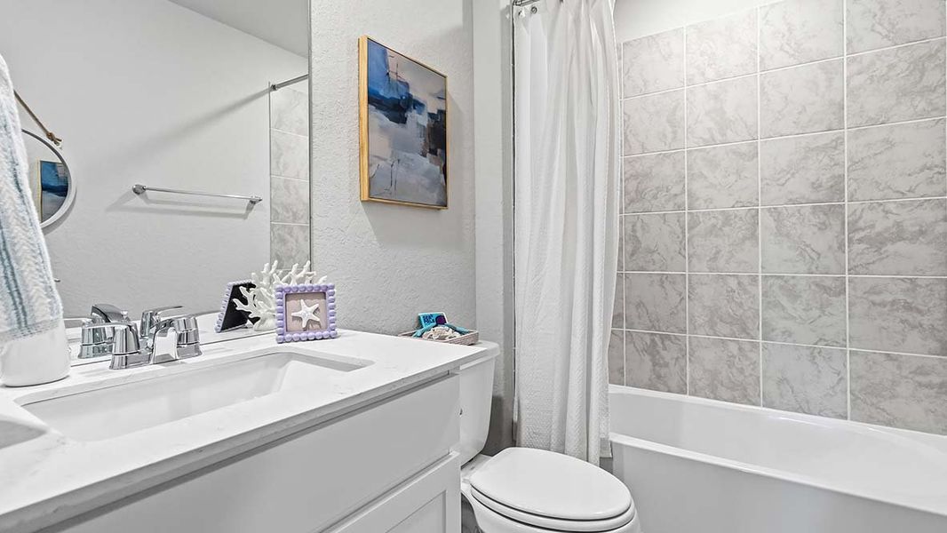 Furnished interior in a model home at Blue Ridge Ranch in San Antonio (Image 45).