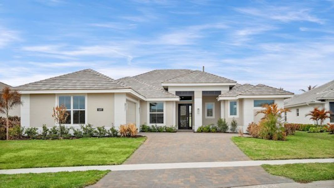 Front exterior of a home in the Bent Pine Preserve community, located in Vero Beach, FL (Image 55).