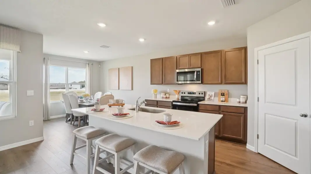 Furnished interior in a model home at Summit View in Dade City (Image 5).