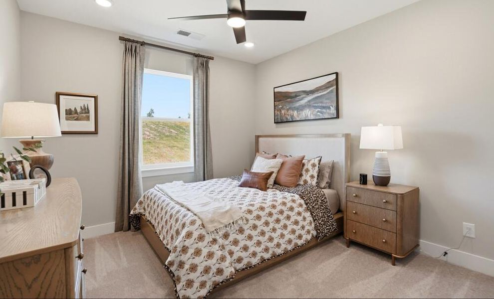 Furnished interior in a model home at Enclave at Riverdale in Huntersville (Image 18). Furnished interior in a model home at Enclave at Riverdale in Huntersville (Image 18).