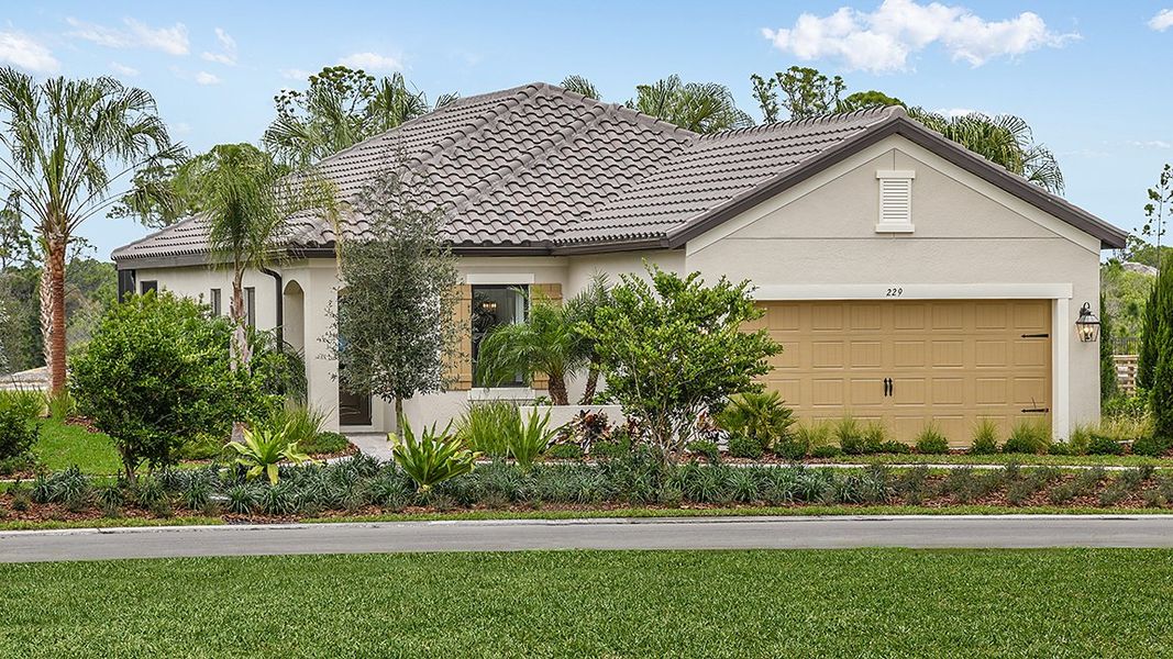 Front exterior of a home in the Vicenza community, located in Venice, FL (Image 5).