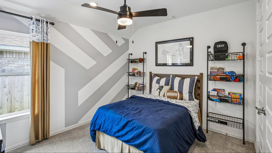 Discover refined comfort in this Cypress Green bedroom with a chic geometric wall and upscale sports accents. Discover refined comfort in this Cypress Green bedroom with a chic geometric wall and upscale sports accents.