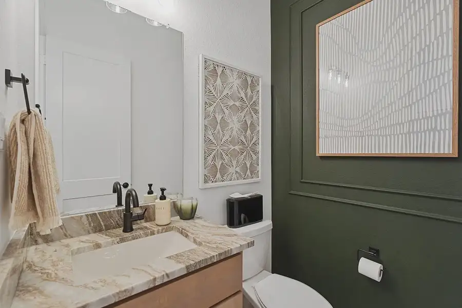 Furnished interior in a model home at Brookewater 60's in Rosenberg (Image 7).