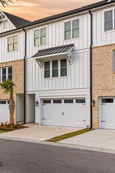 Front exterior of a home in the Anchors Bend Townes community, located in Wilmington, NC (Image 20).