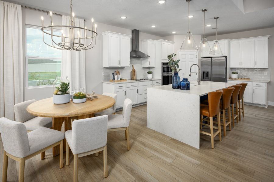 Furnished interior in a model home at Cypress Reserve in Clermont (Image 3).