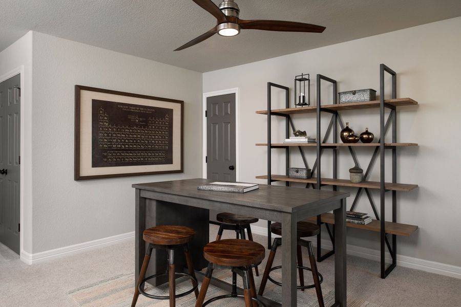 Furnished interior in a model home at Sunterra 50ft in Katy (Image 5).