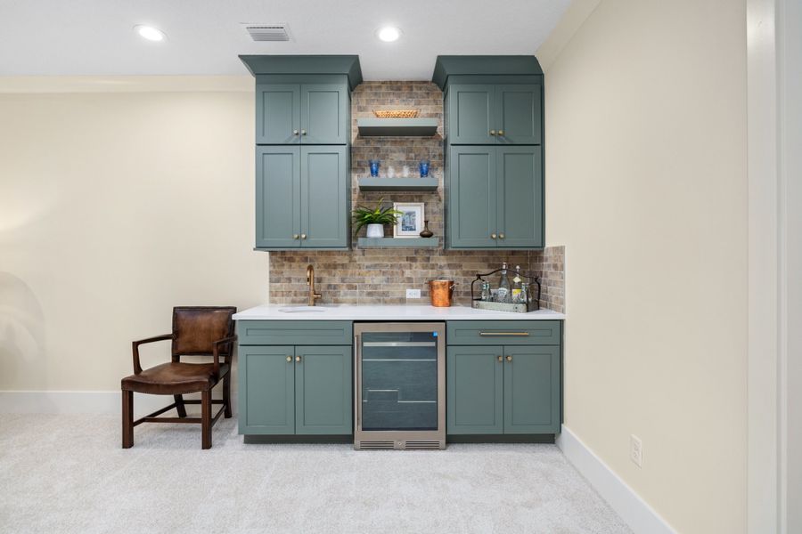 Furnished interior in a model home at Hidden Creek at SilverLeaf 80' Gold Series in St. Augustine (Image 80).