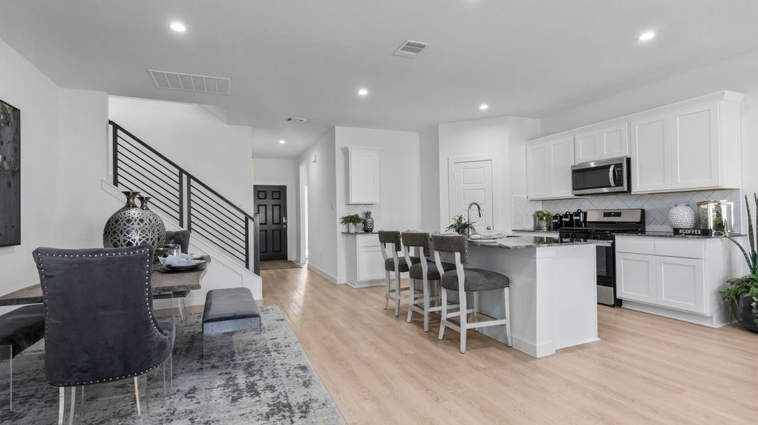 Furnished interior in a model home at Caldwell Crossing in Iowa Colony (Image 6). Furnished interior in a model home at Caldwell Crossing in Iowa Colony (Image 6).