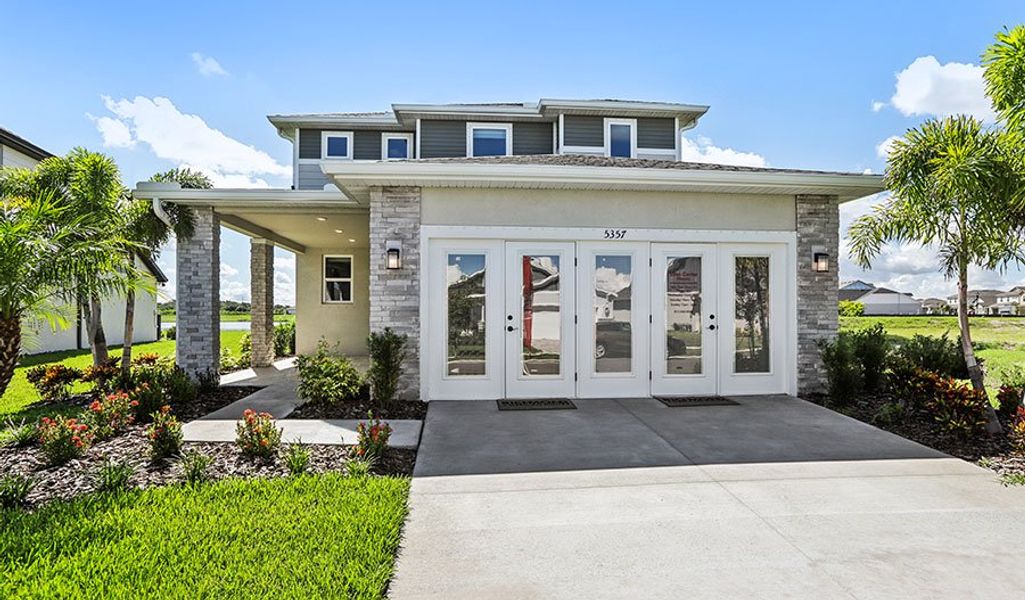 Front exterior of a home in the Waterset community, located in Ruskin, FL (Image 7).