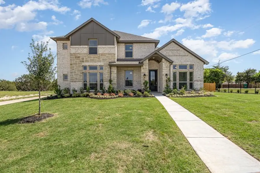 Front exterior of a home in the Ten Mile Creek Estates community, located in DeSoto, TX (Image 8). Front exterior of a home in the Ten Mile Creek Estates community, located in DeSoto, TX (Image 8).