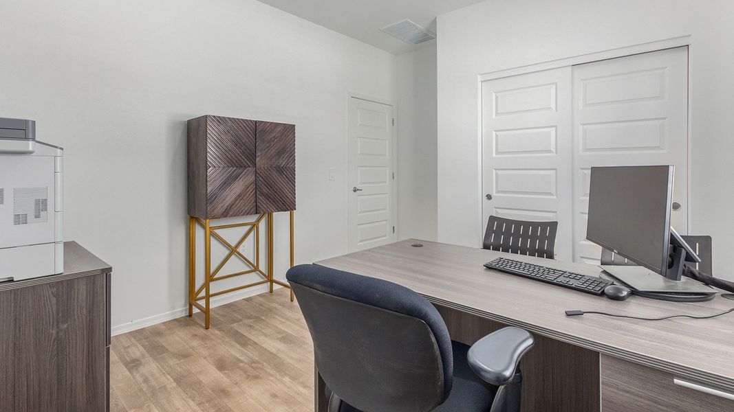 Furnished interior in a model home at Roadrunner Estates in Tucson (Image 34).