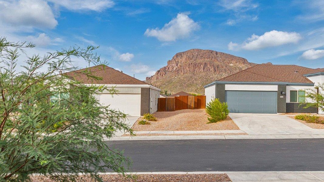 Front exterior of a home in the Roadrunner Estates community, located in Tucson, AZ (Image 3).