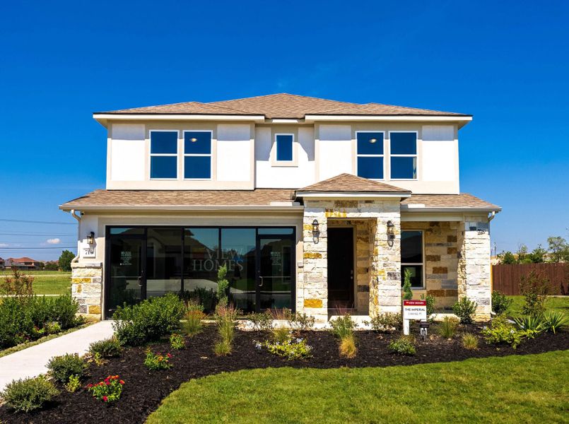 Front exterior of a home in the August Fields community, located in New Braunfels, TX (Image 5).