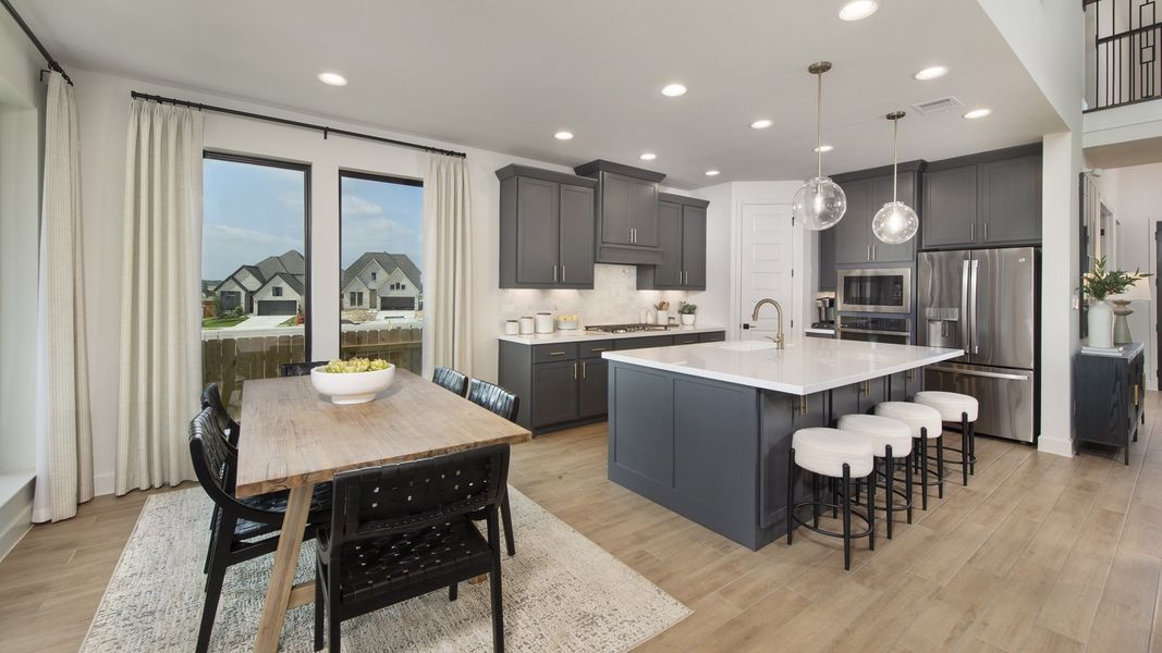 Furnished interior in a model home at Lariat 50' in Liberty Hill (Image 6).