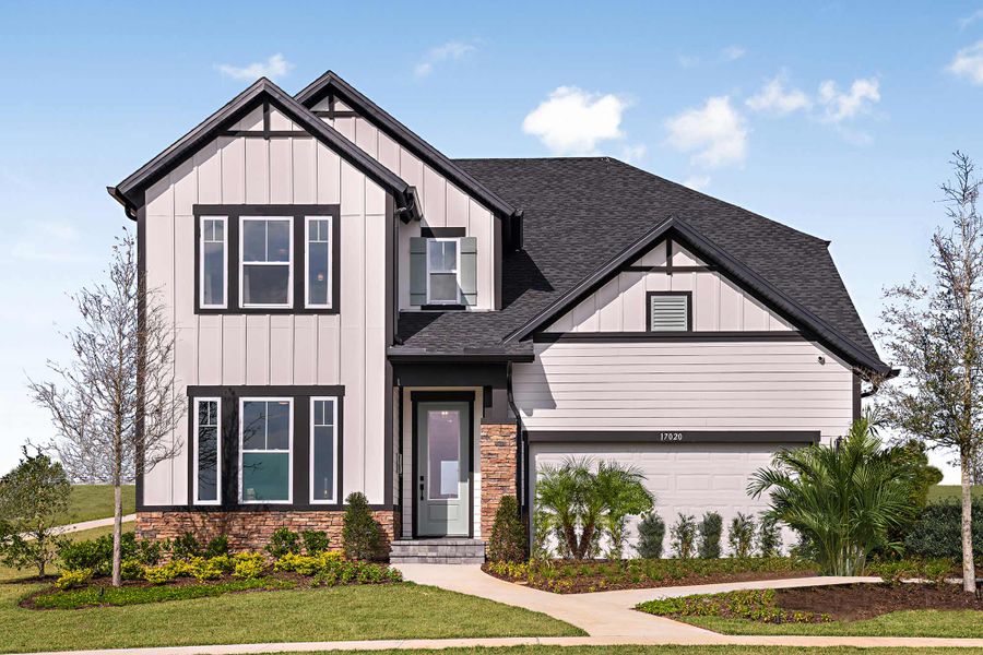Front exterior of a home in the John's Lake Landing - Cottage Series community, located in Clermont, FL (Image 2).