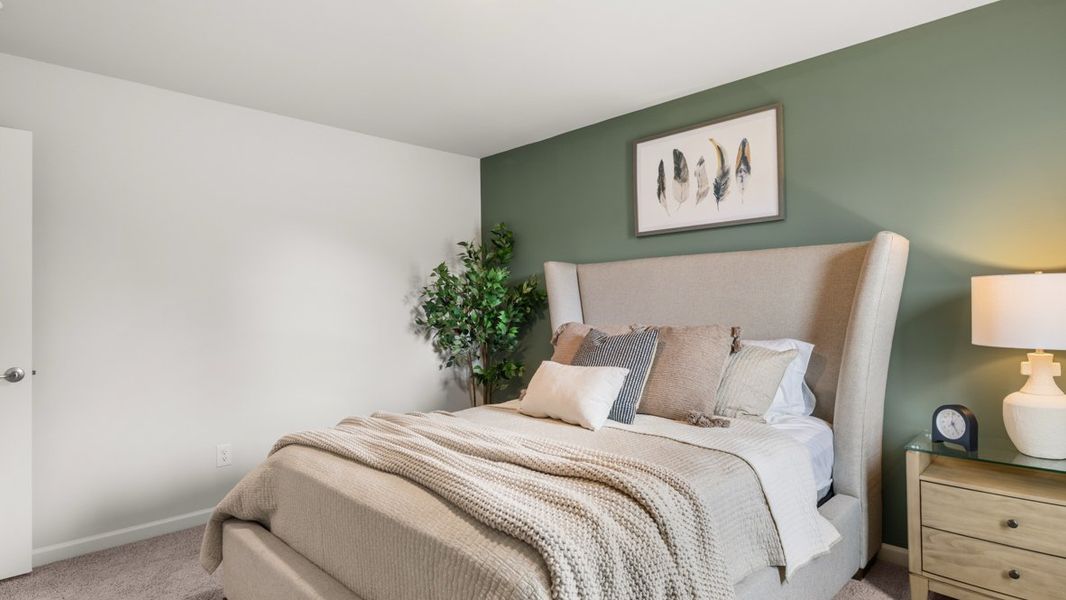 Furnished interior in a model home at Fairway 17 at Mirror Lake in Villa Rica (Image 43).