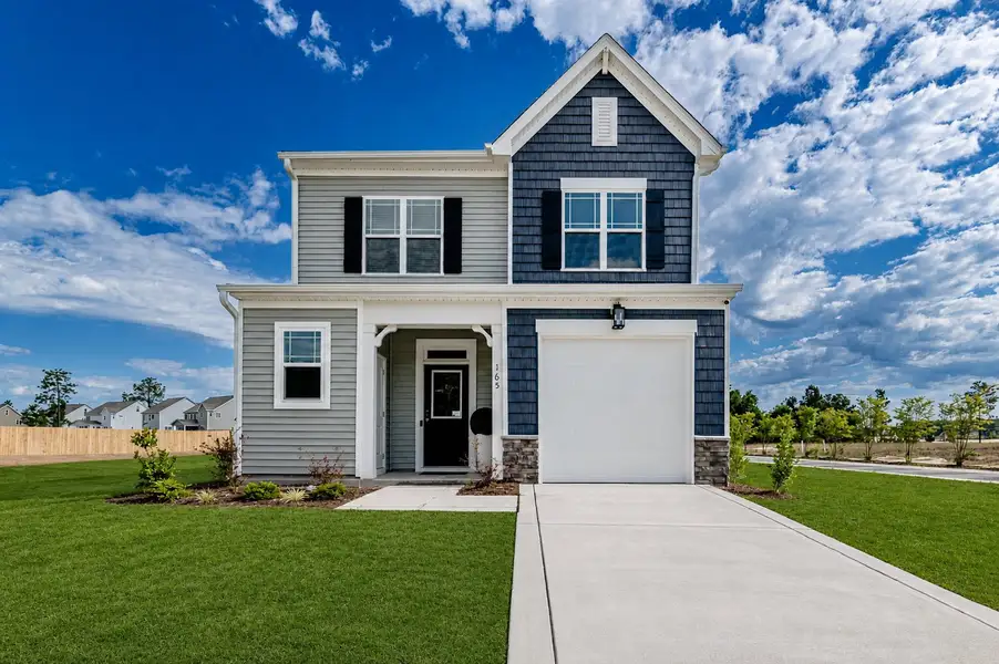 Front exterior of a home in the Sandy Springs community, located in Aberdeen, NC (Image 10).